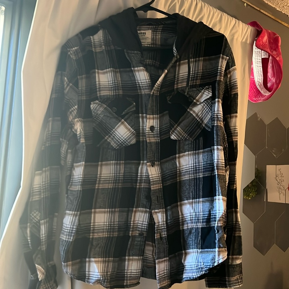 multicolored flannel with dark grey hood